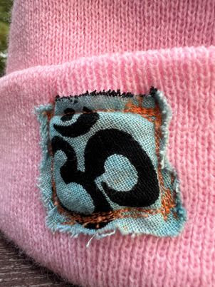 PINK Missionaries of Consciousness OM Knit Cuffed Beani
